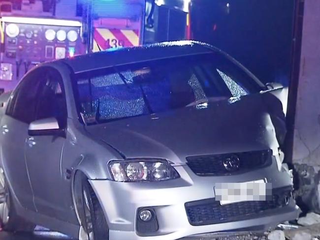 Screen grabs - Police are investigating a serious crash at Christies Beach overnight., Just before 1am Wednesday 8 March, police were called to a serious crash on Gilbert Road. When police arrived, they saw that a silver Holden sedan had mounted the kerb and crashed into a stobie pole., The passenger, a 25-year-old woman from Christies Beach was taken to hospital with life threatening injuries whilst the driver, a 24-year-old Seaford Heights man was uninjured. Picture: 7NEWS (MUST CREDIT)