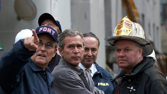 Then New York mayor Rudy Giuliani with then US president George W Bush at the destroyed World Trade Centre.