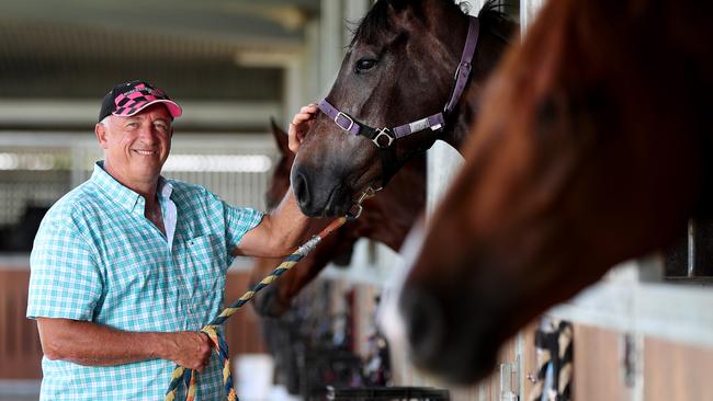 Trainer Robert Heathcote at his Eagle Farm stables with with Zoechelon. Picture: Tara Croser.