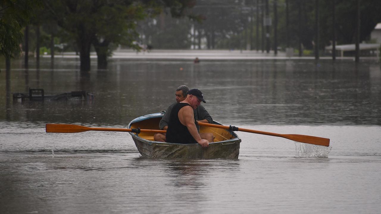 Miles St on Sunday. Floodwaters have inundated much of Ingham, Hinchinbrook Shire, after the Herbert River breached its banks, compounding surface flooding from days of monsoonal rains. Picture: Cameron Bates