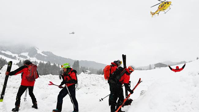 Rescuers hunt for victims of the avalanche near Fieberbrunn, Austria, on Saturday. Picture: Zoom.tirol/APA/AFP