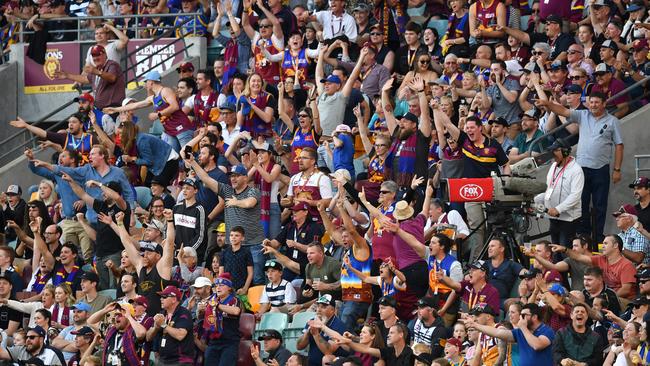 Lions fans lose their collective minds during the thrilling win over the Cats. Picture: AAP Image/Darren England