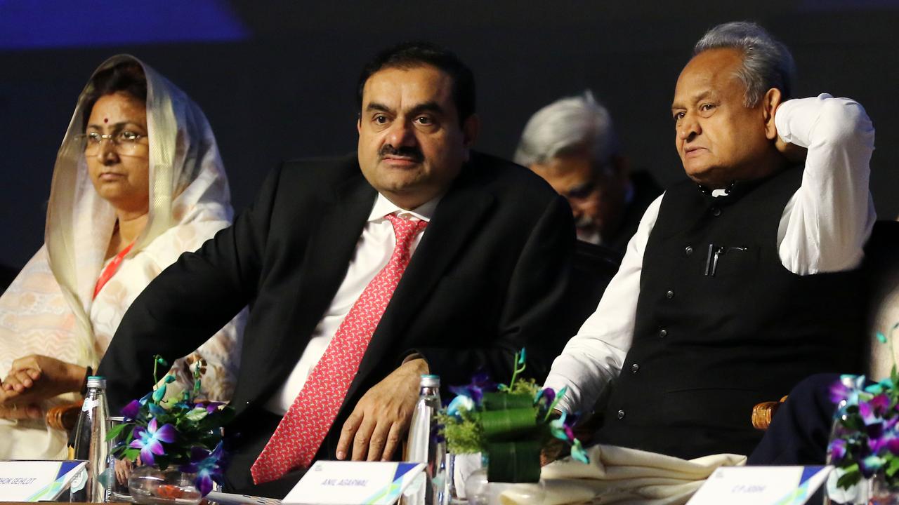 Chief Minister of Rajasthan Ashok Gehlot, Adani Group Chairman Gautam Adani and Congress leader Shakuntala Rawat. Picture: Vishal Bhatnagar/NurPhoto via Getty Images