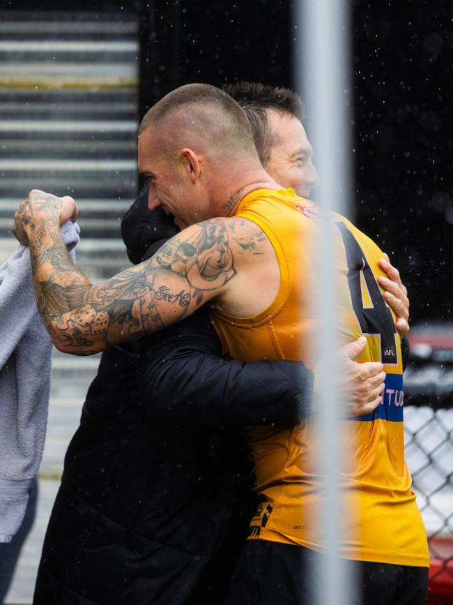 And embraces Dustin Martin. Picture Richmond FC