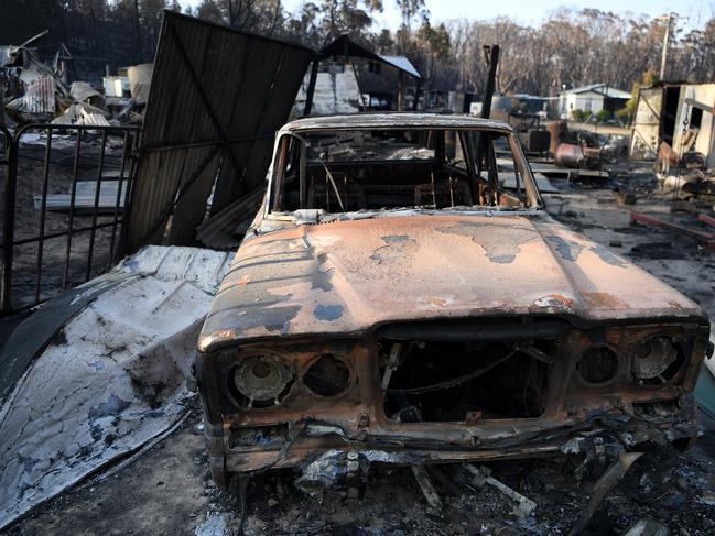 A burnt out car in a property destroyed by a bushfire at Torrington, near Glen Innes, on Sunday. Picture: AAP/Dan Peled