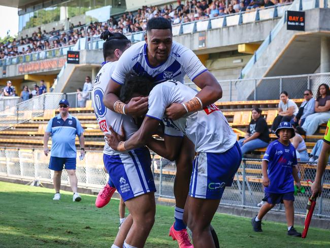 Bulldogs celebrate a Ratu Rinakama try. Picture: Adam Wrightson Photography.