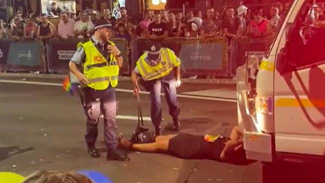 The senator on the ground during the Sydney Mardi Gras parade.