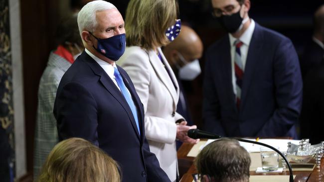 Mike Pence presides in the House Chamber as the joint session of Congress reconvenes.