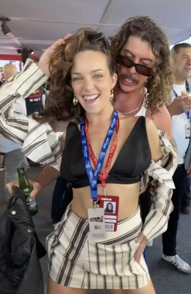 Abbie Chatfield with Peking Duk's Adam Hyde at the Melbourne Grand Prix. Picture: Instagram