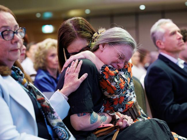 SYDNEY, AUSTRALIA - NewsWire Photos SEPTEMBER 15, 2023:The Disability Royal Commission Ceremonial Closing Sitting in Sydney at the Shangri-La Hotel. A woman is visibly upset by a video played at the event. Picture: NCA NewsWire / David Swift