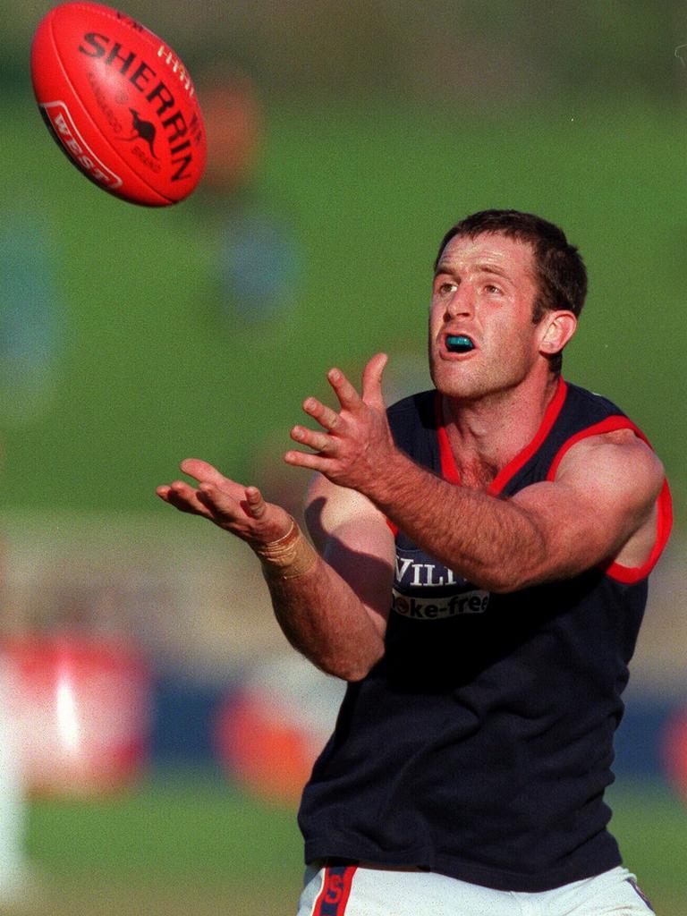 Lachy Bowman takes a mark while playing for Norwood.