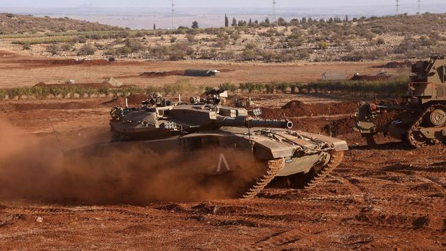 An Israeli Merkava tank takes part in a military drill near the border with Lebanon in the upper Galilee region of northern Israel. Picture: AFP