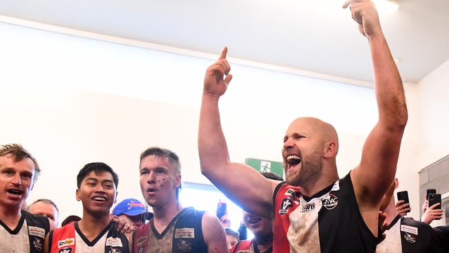 Gary Ablett sings the song in the rooms after Creswick’s victory in the Central Highlands Football League on Saturday. Photo by Josh Chadwick