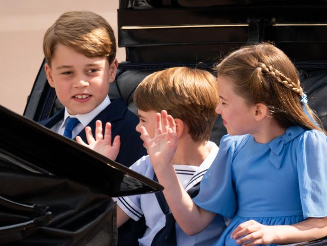 Prince George, Prince Louis and Princess Charlotte wave to the crowds. Picture: AFP