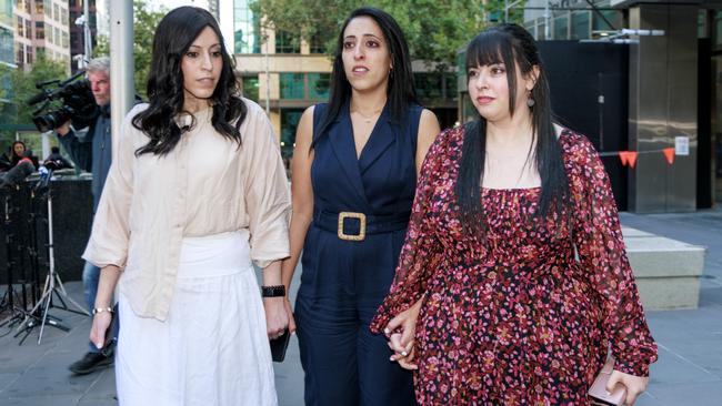 The sisters held hands as they spoke outside the court. Picture: NCA NewsWire / David Geraghty