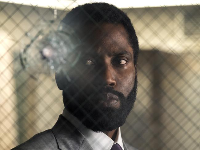 This image released by Warner Bros. Pictures shows John David Washington in a scene from "Tenet." (Melinda Sue Gordon/Warner Bros. Pictures via AP)