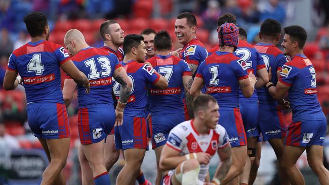 Newcastle’s loyal fans had plenty to cheer against the hapless Dragons. Picture: Brett Costello