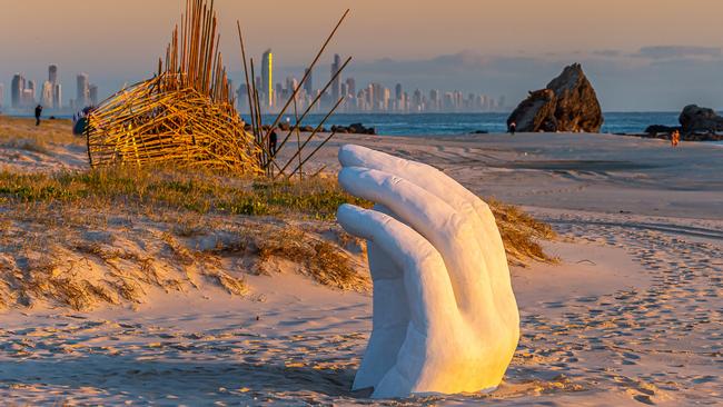 ‘Hand In The Sand’ by Karl Meyer features in this year’s Swell Sculpture Festival. Photo: PBR Images