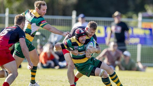 Kris Burton is tackled in the 2018 grand final. Picture: Jerad Williams