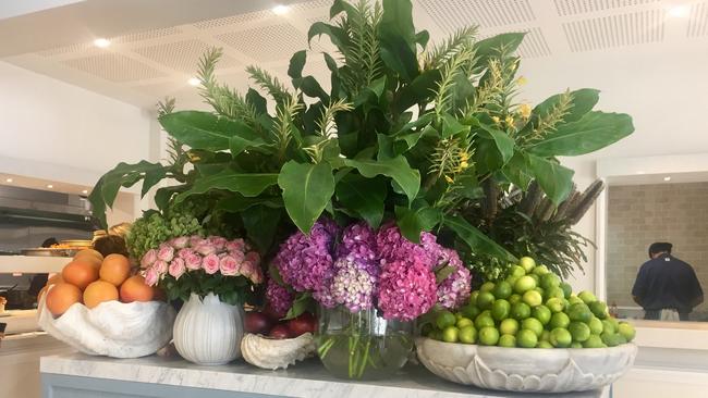 Fresh flowers and fruit displays are part of the Boathouse look.