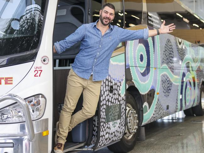 Indigenous artist Jacob Sarra with the Volva Australia Group bus. Picture: Peter Wallis