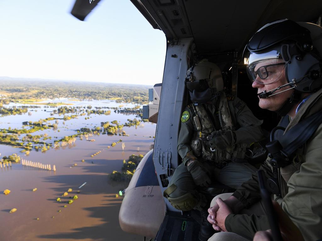 Australian Prime Minister Scott Morrison inspects damage created by floodwaters from a helicopter during a visit to flood-affected areas in Sydney, Wednesday, March 24, 2021. Picture: Lukas Coch/Pool/AAP