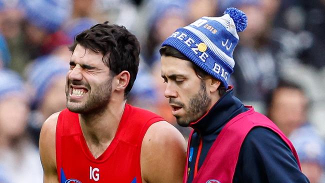 MELBOURNE, AUSTRALIA - JUNE 10: Christian Petracca of the Demons leaves the field injured during the 2024 AFL Round 13 match between the Collingwood Magpies and the Melbourne Demons at The Melbourne Cricket Ground on June 10, 2024 in Melbourne, Australia. (Photo by Dylan Burns/AFL Photos via Getty Images)