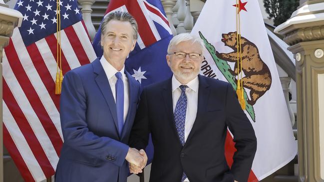 Gavin Newsom and Kevin Rudd shake hands in front of the Leland Stanford Mansion before signing a joint climate and energy pact in Sacramento, California.