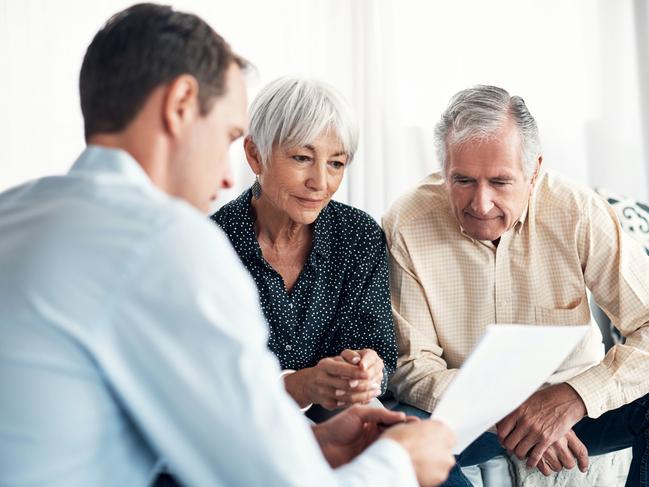 Shot of a senior couple getting advice from their financial consultant at home