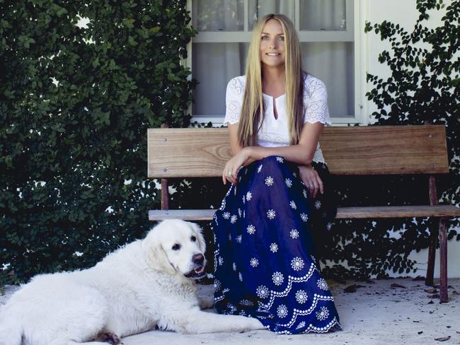 Dinnigan said setting her store up in Paddington was “no doubt” the beginning of her career. Pictured with dog Louis.