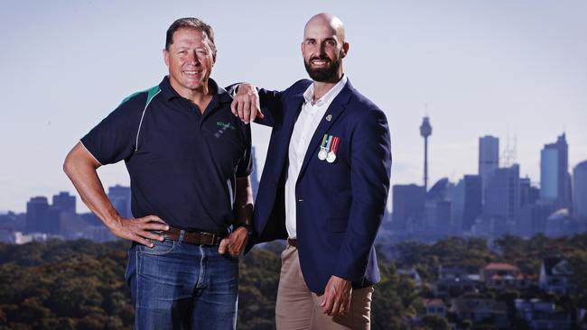 Ex Wallaby player Phil Kearns (left) and former army sergeant Justin Donnelly (right) in Mosman on Thursday. Picture: Sam Ruttyn