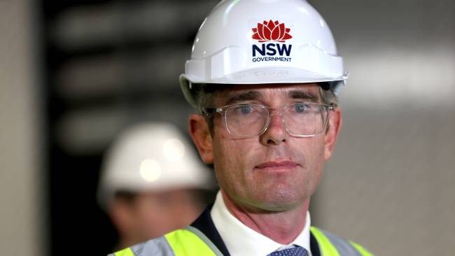 NSW Premier Dominic Perrottet on Friday said "we need to get to a point where, where you are sick, you stay at home, if you’re not sick you go to work and you go to school". Picture: NCA NewsWire / Damian Shaw