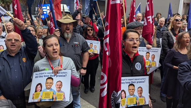Hundreds of essential workers from across NSW rallied outside 52 Martin Place to oppose the government's proposed cuts to workers compensation. Picture: Gaye Gerard