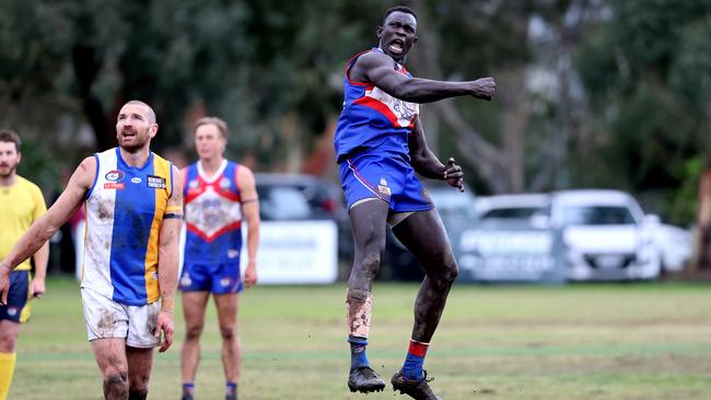 Majak Daw celebrates a goal for North Heidelberg. Picture: Hamish Blair