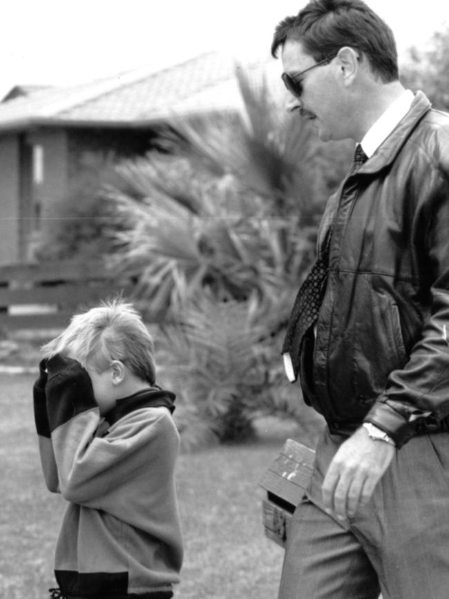 Matthew Pearce with a detective soon after the tragedy was discovered.