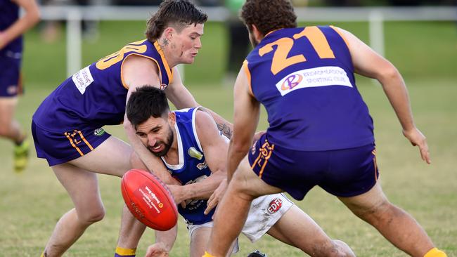 Coburg Districts’ George Pilipasidis is put under pressure against Jacana on Saturday. Picture: Steve Tanner