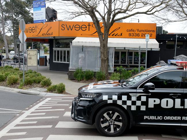 Police at the Sweet Lulus cafe in Keilor East where alleged gangland figure Gavin Preston was shot on Saturday morning. Picture: Andrew Henshaw