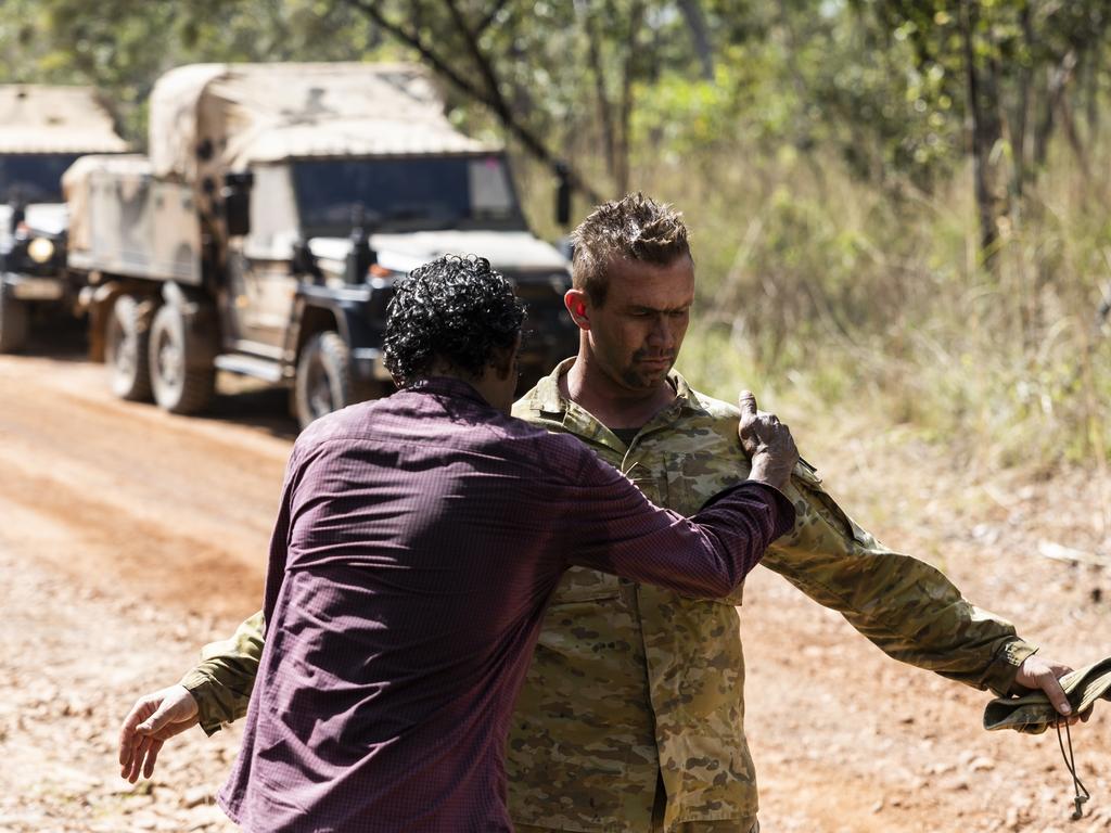 Sergeant Chris Diamond is given a blessing by Wudikapildyerr man Kenny Ahfat. Picture: Dylan Robinson