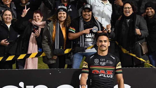 Daine Laurie with his family who travelled to see his first NRL game at Penrith Stadium.