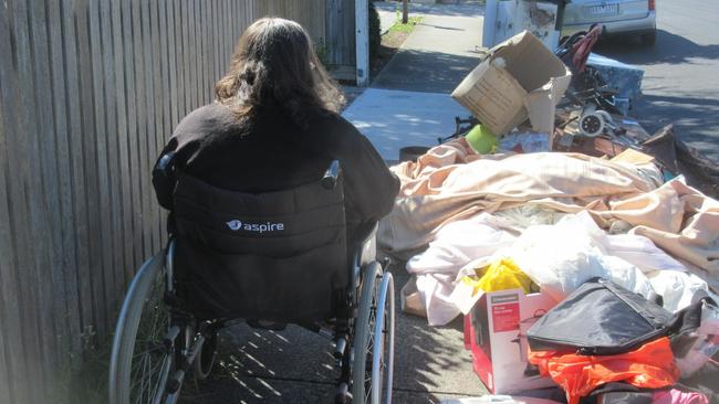 Dumped rubbish in Rosstown Rd had to be moved to allow a woman to pass in her wheelchair.