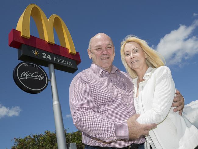 Former State of Origin player Gary Coyne and his wife Gail at one of his nine McDonald's restaurants. Picture: Peter Wallis