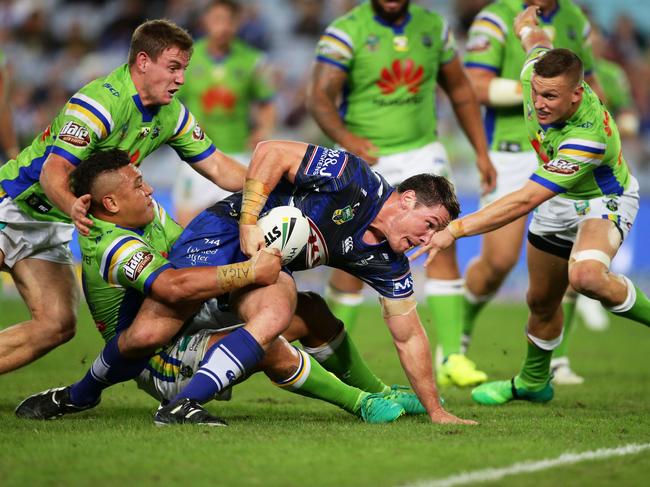 SYDNEY, AUSTRALIA - APRIL 29:  Josh Jackson of the Bulldogs is tackled just short of the line during the round nine NRL match between the Canterbury Bulldogs and the Canberra Raiders at ANZ Stadium on April 29, 2017 in Sydney, Australia.  (Photo by Matt King/Getty Images)