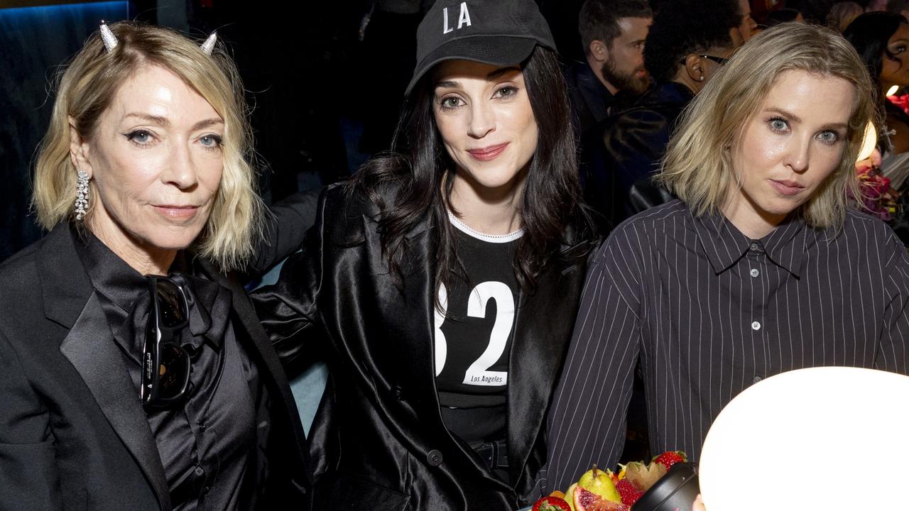 St Vincent sits with Sonic Youth’s Kim Gordon and who fans believe is Leah. Picture: Emma McIntyre/Getty Images for The Recording Academy