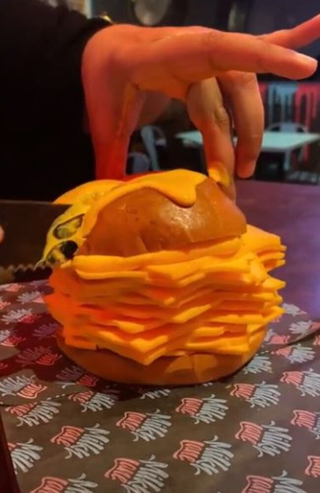 Milky Lane’s The Real Cheeseburger consists of has 20 slices of American cheddar. Picture: news.com.au