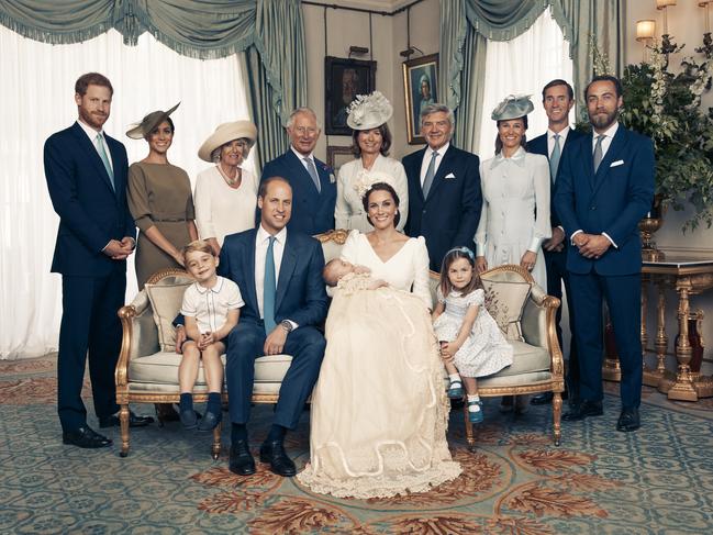 The Duke and Duchess of Cambridge, (Seated left to right) Prince George, The Duke of Cambridge, Prince Louis, The Duchess of Cambridge, Princess Charlotte, (Standing left to right) The Duke of Sussex, The Duchess of Sussex, The Duchess of Cornwall, The Prince of Wales, Mrs. Carole Middleton, Mr. Michael Middleton, Mrs. Pippa Matthews, Mr. James Matthews, Mr. James Middleton pose for an Official Portrait following the christening of Prince Louis taken in the Morning Room at Clarence House in St James's Palace on July 9, 2018 in London, England. (Photo by CAMERA PRESS/Matt Holyoak/The Duke and Duchess of Cambridge via Getty Images)