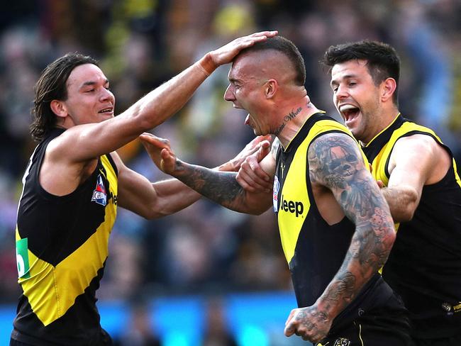 A pat on the head for Richmond's Dustin Martin after last quarter goal during the AFL Grand Final between the GWS Giants and Richmond Tigers at the MCG on September 28, 2019 in Melbourne. Picture. Phil Hillyard