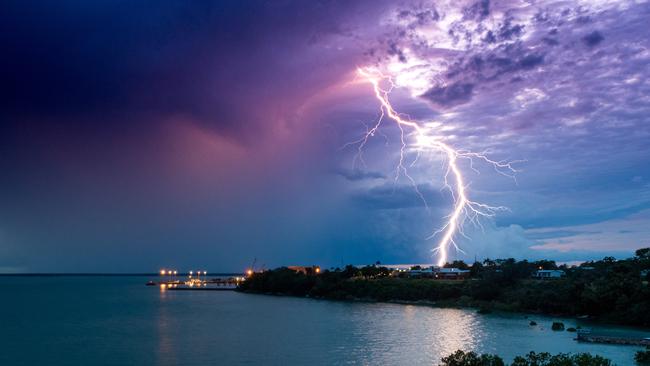 A slow moving lightning storm passes over the Larrakeyah Barracks in Darwin on Saturday night. Picture: Che Chorley