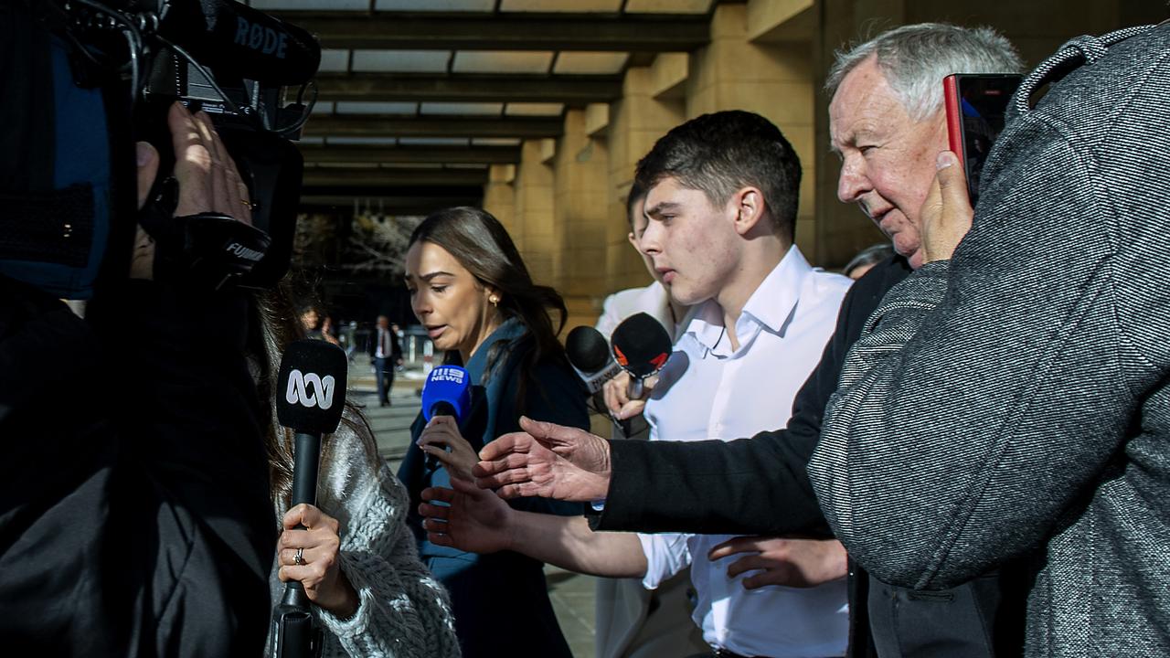 Yandle, centre, and lawyer Stephen Ey outside court. Picture: NewsWire / Mark Brake