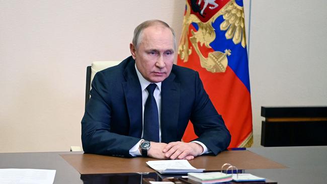 Russian President Vladimir Putin chairs a meeting with members of the Security Council. Picture: AFP.