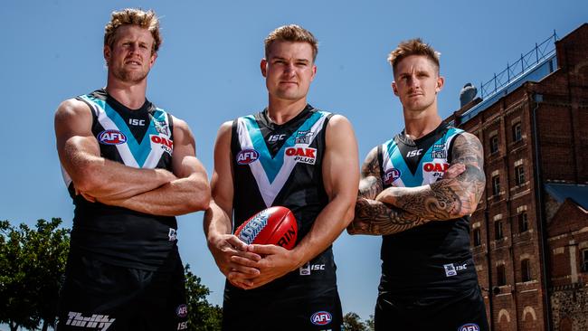 Port Adelaide vice-captain Hamish Hartlett (right) with new co-captains Tom Jonas and Ollie Wines. Picture: MATT TURNER.